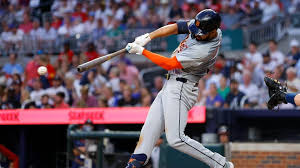 Unidentified player hitting the ball